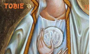 Fragment ikony przedstawia Matkę Boską w białych szatach. W dłoniach trzyma opłatek z napisem serce. Po lewej stronie napis tobie. Głowę Maryi okalają gwiazdy. Tło jest złote.